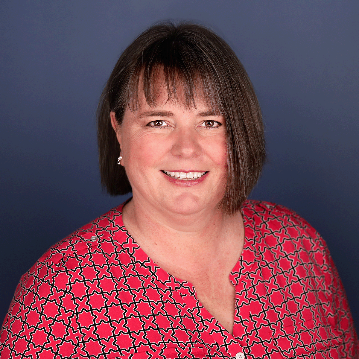 Headshot photo of Gabi Doyne